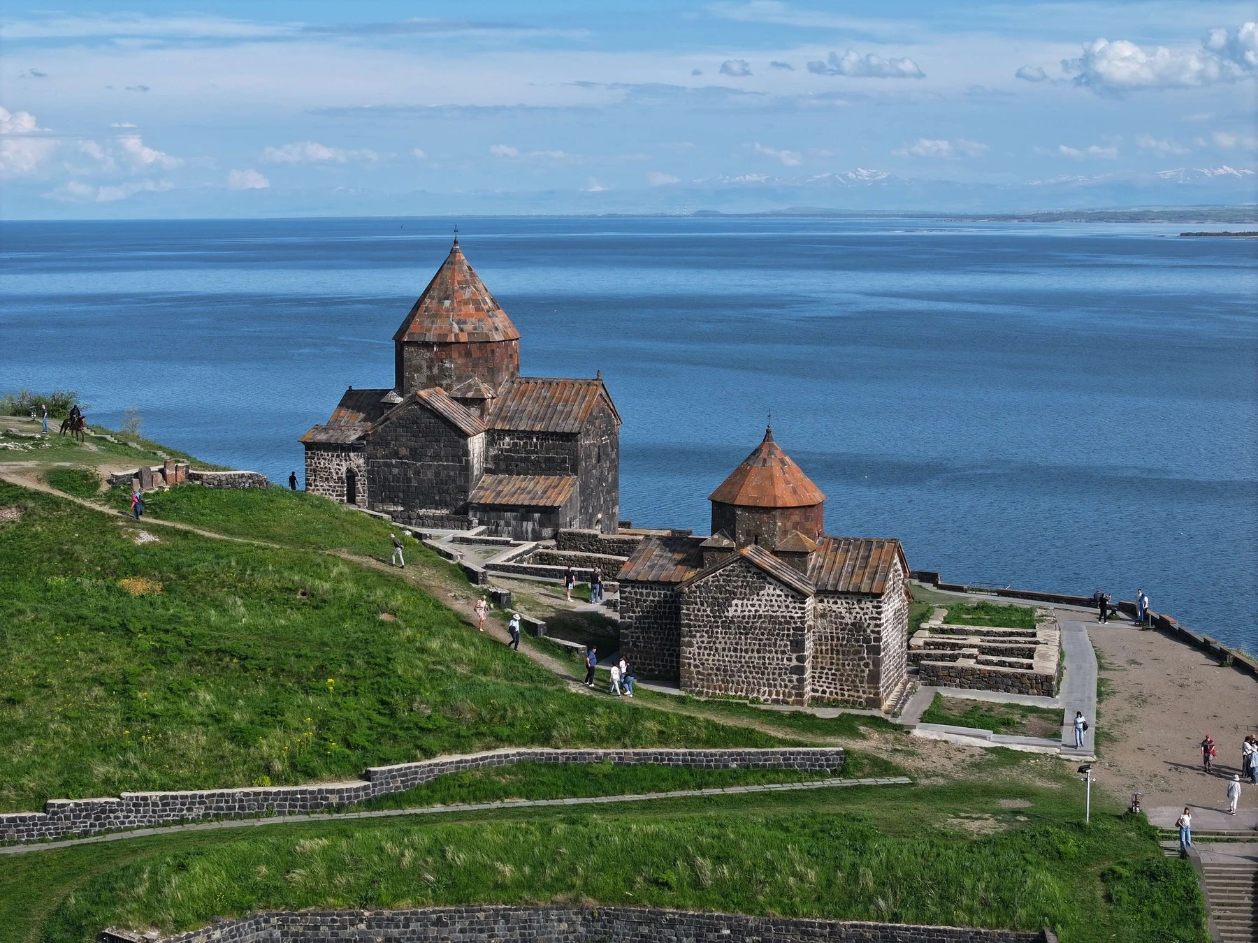 Sevanavank monastery on its peninsula above the blue expanse of Lake Sevan