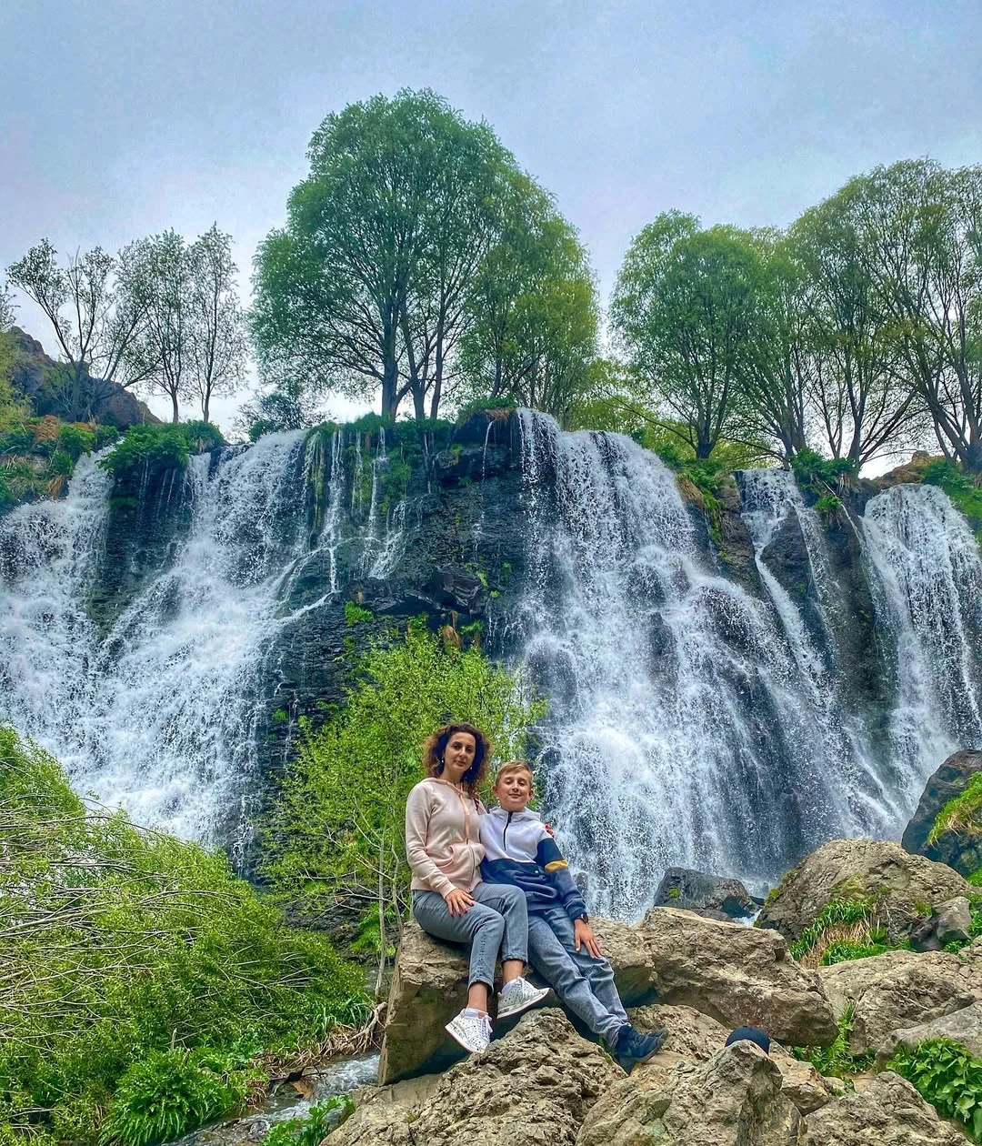 The 18-metre Shaki Waterfall spilling over dark rock in Syunik